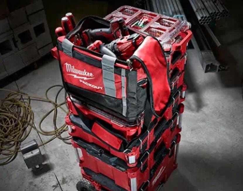 Milwaukee PACKOUT 15" Tool Bag On Top of Stack of Toolboxes