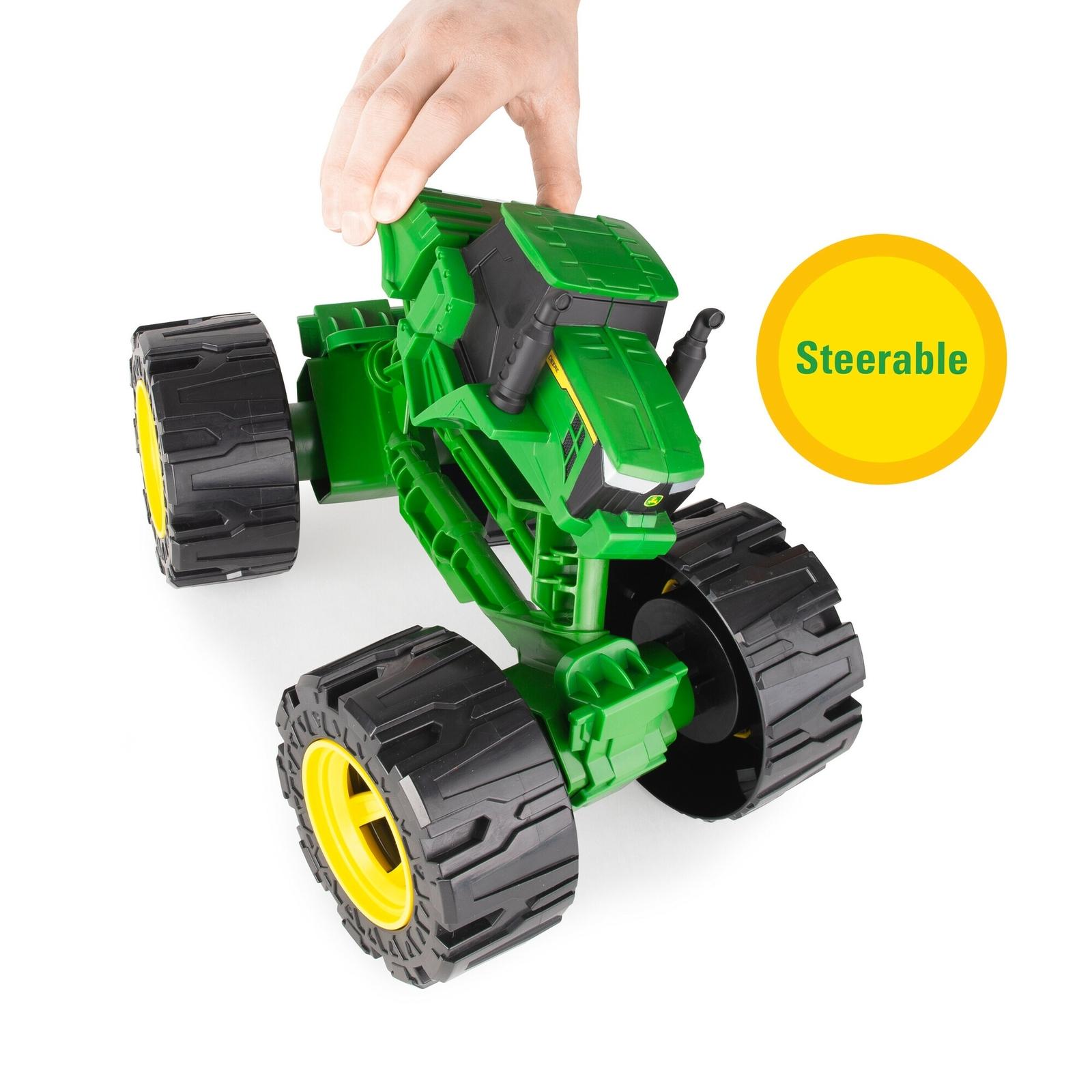 John Deere Monster Treads 12 Inch Tractor Toy showing it is steerable