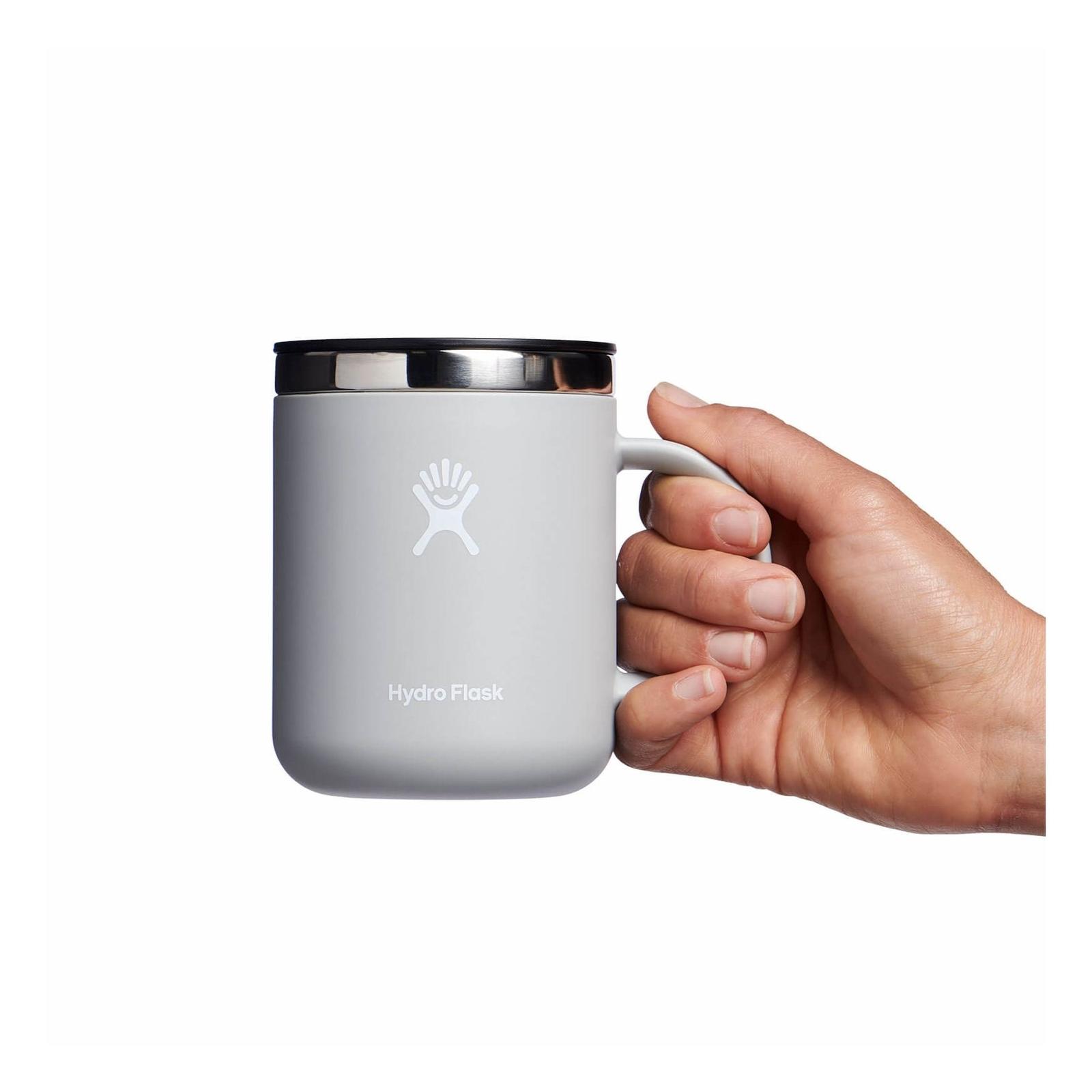 holding mug with hand birch