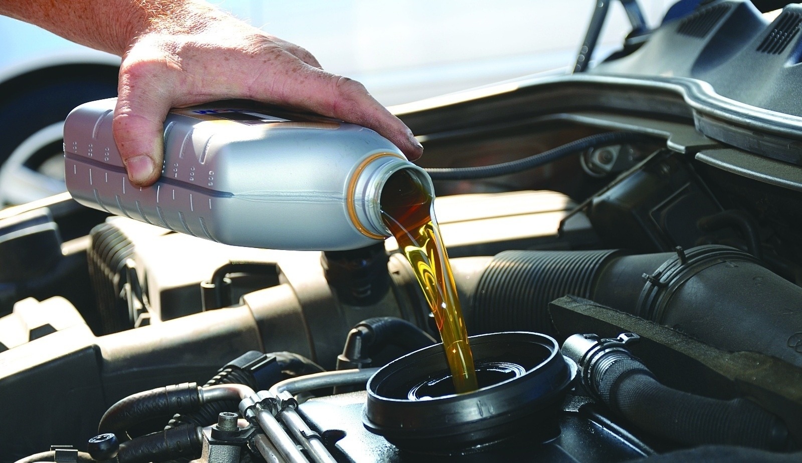 Oil being poured into engine